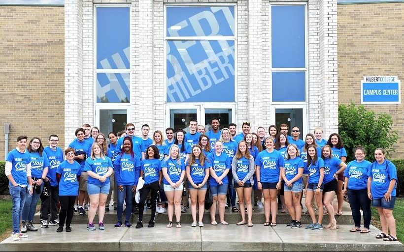 Hilbert College sophomores participating in Sophomore Service pose in front of the Campus Center